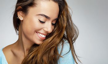 Image Text: 500x332_0075_Portrait of a young woman with a beautiful smile